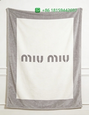 Miumiu Throw Blankets